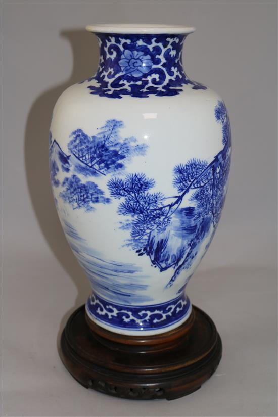 A Chinese porcelain blue and white baluster vase, 13.25in.
